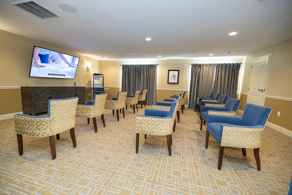 movie room at The Township Senior Living with signage in Battlefield, Missouri