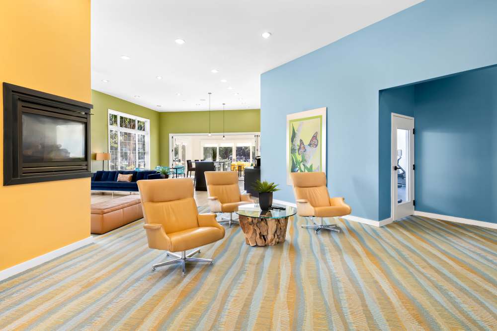 Clubhouse With Patterned Carpet And Several Windows at Arbor Brook in Murfreesboro, Tennessee