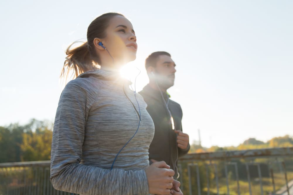 Residents jogging near Harborside Apartment Homes in Slidell, Louisiana
