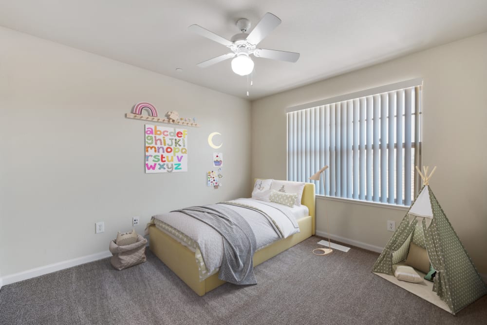 A furnished bedroom with a child's bed and toys at Catalina Heights in Camarillo, California