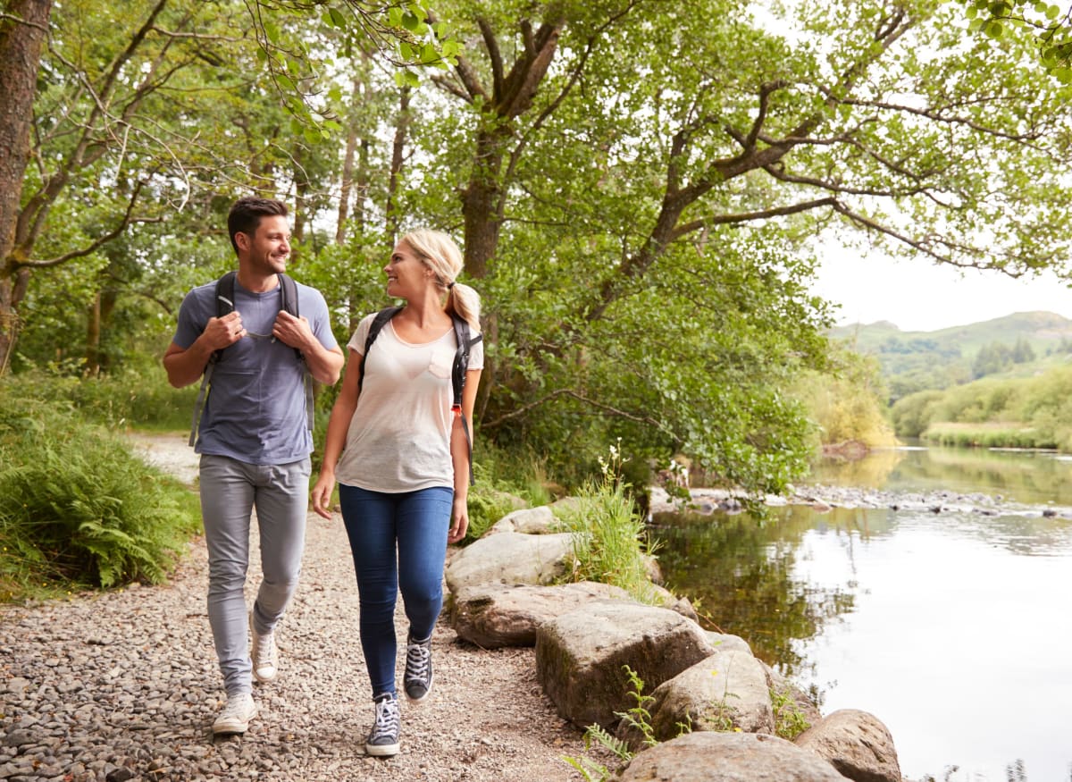 Resident couple hiking near Clifton Ridge Apartments in Louisville, Kentucky