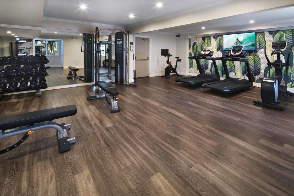 Onsite fitness center with plenty of cardio equipment at Haven Warner Center in Canoga Park, California