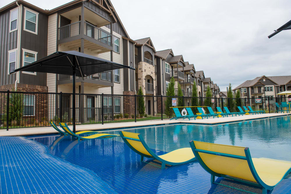 Outdoor resort-style pool at 97@ North Oak in Kansas City, Missouri