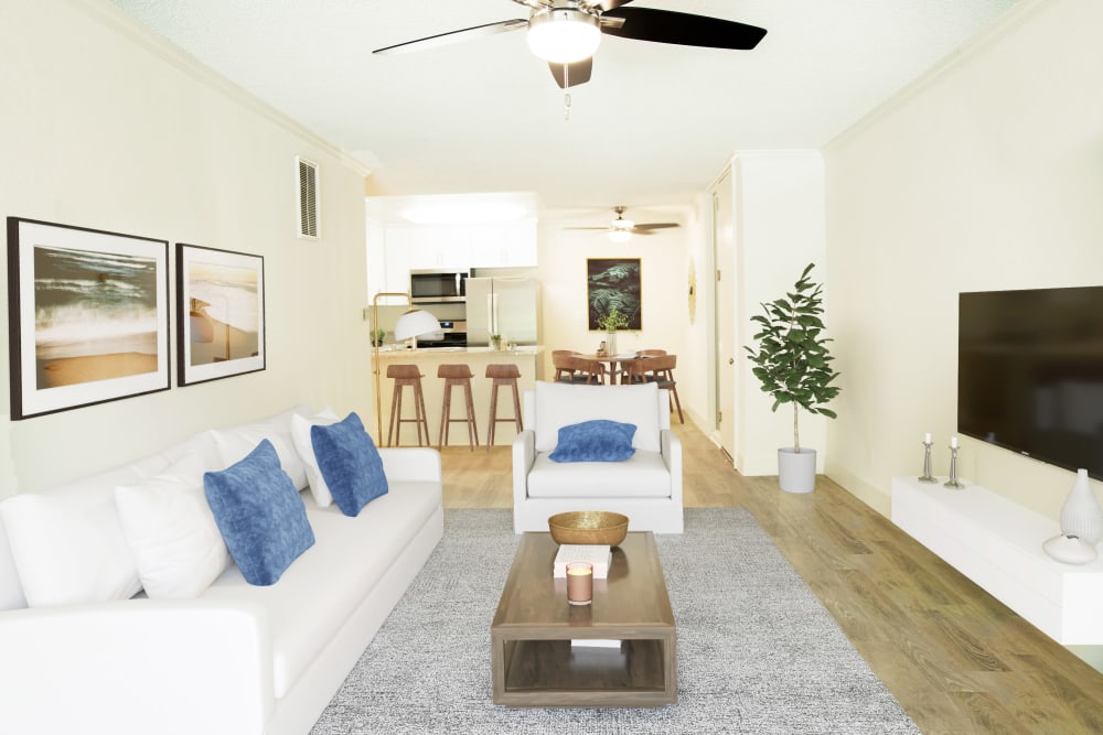 Open-concept living room, dining room and kitchen at Casa Granada in Los Angeles, California