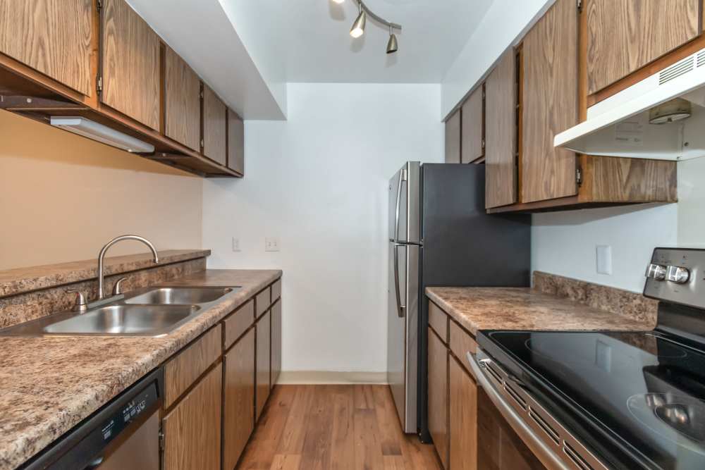 Kitchen with classic oak cabinets and stainless appliances