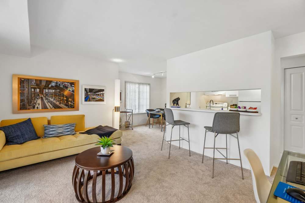 Modern-Style Living Room at Saddle Creek Apartments in Novi, Michigan