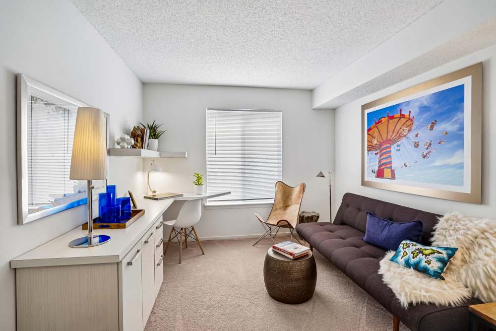 Spacious bedroom with plush carpeting and a walk-in closet at Briar Cove Terrace Apartments in Ann Arbor, Michigan
