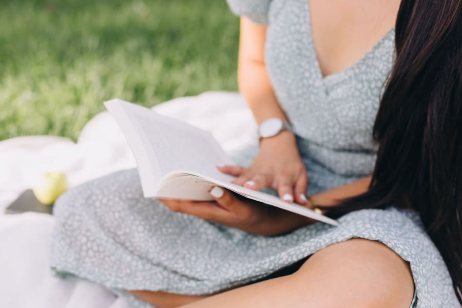 Resident reading in the park near 17 Barkley in Gaithersburg, Maryland