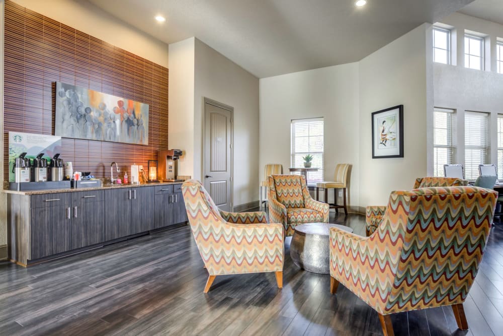 Clubhouse cafe bar with comfortable seating for enjoying your morning coffee at The Addison at South Tryon in Charlotte, North Carolina