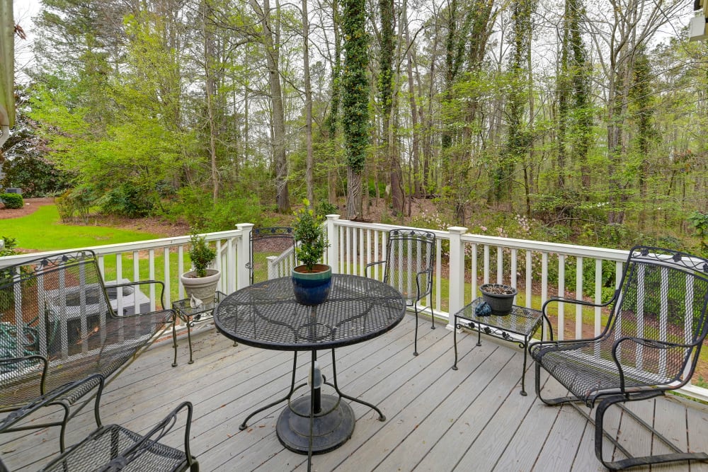 Balcony seating overlooking the woods at The Clinton Presbyterian Community in Clinton, South Carolina