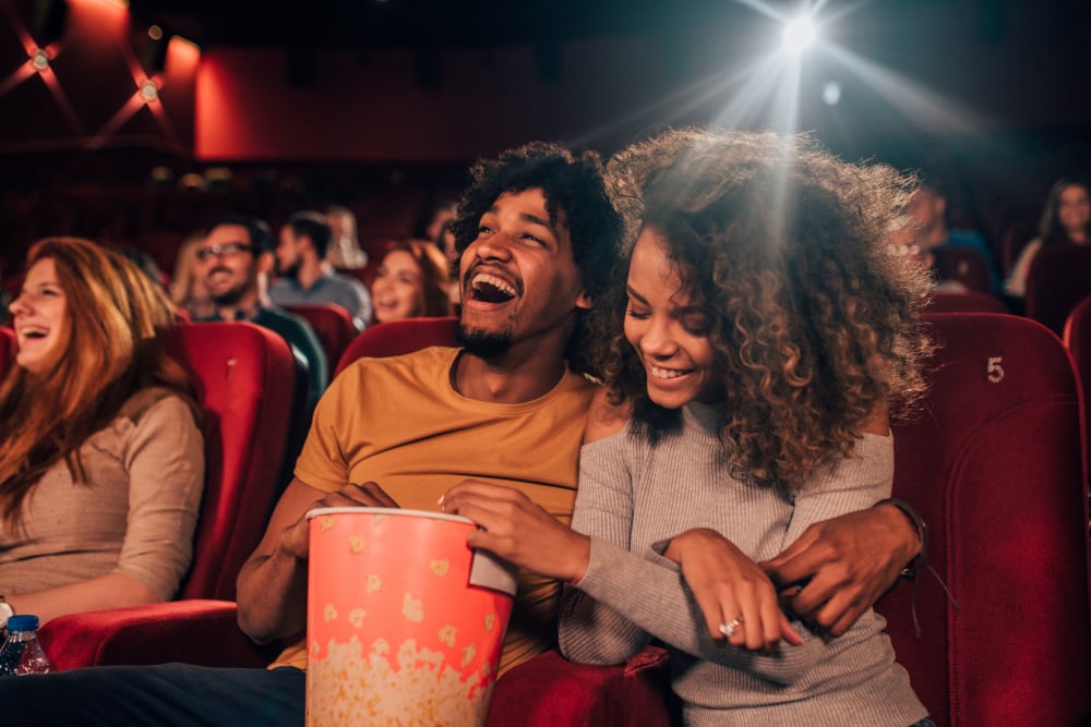 Residents at a movie theater near The Residences at Renaissance in Charlotte, North Carolina