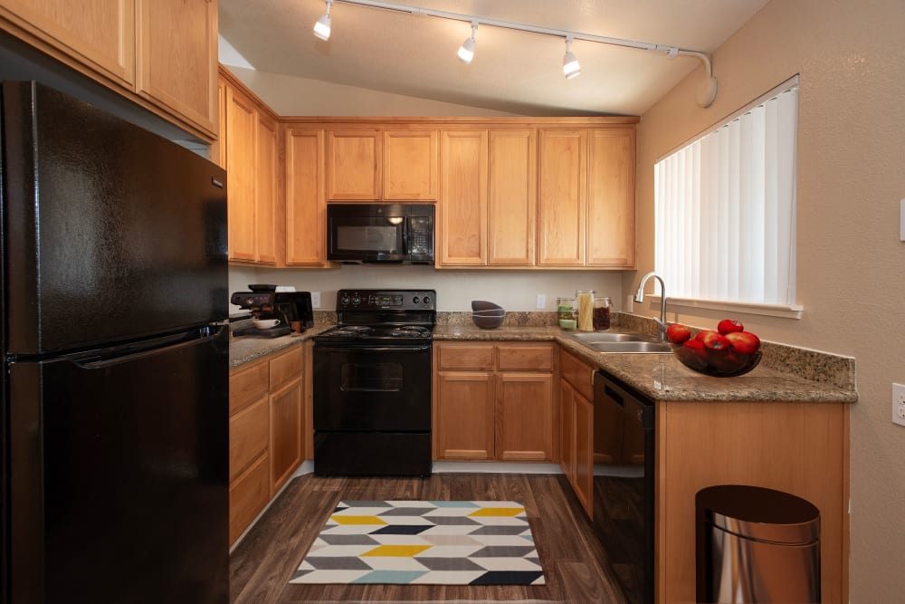 Open-concept kitchen at Castle Hill Apartments in Sacramento, California
