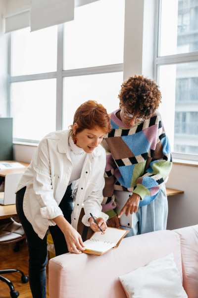 Two young business colleagues working at AMP Residential in Grand Rapids, Michigan    