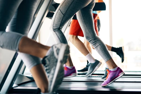 Residents running on a treadmill at Parkside Towns in Richardson, Texas