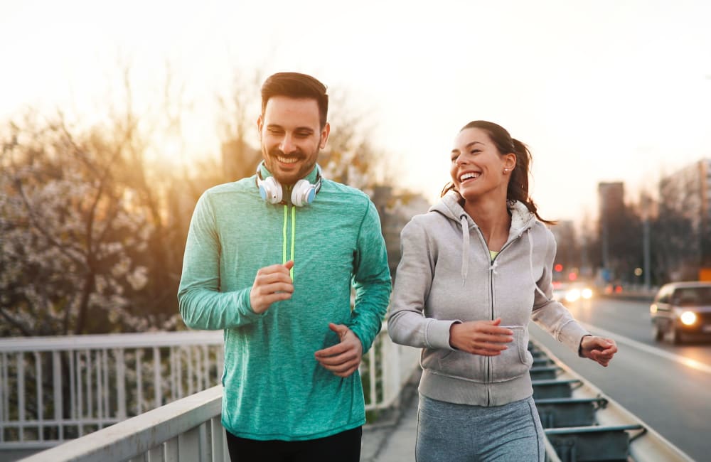 Residents going for a morning jog near Sofi at 3rd in Long Beach, California