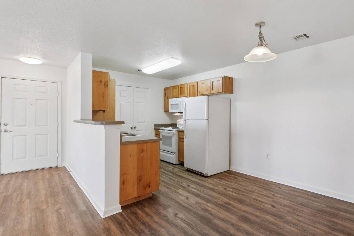 Kitchen with stainless-steel appliances at Nottingham Village in Gardner, Kansas