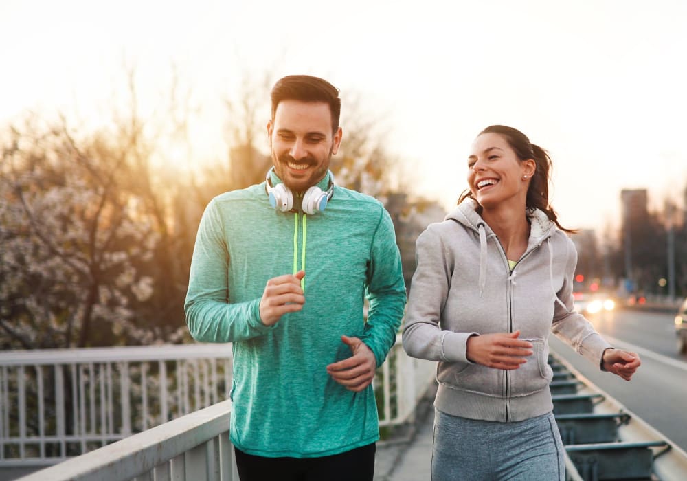 Resident couple out for a jog near The Villas at Woodland Hills in Woodland Hills, California