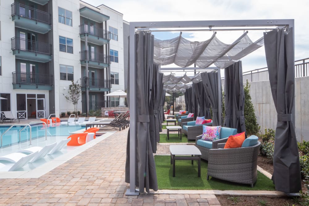 Pool side lounge at The Local | Apartments in Sugar Hill, Georgia