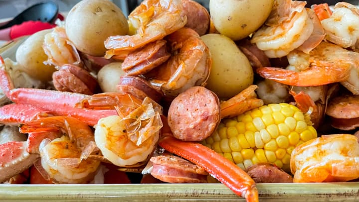 A close-up of shrimp, sausage, potatoes, and corn from a seafood restaurant in Frisco.