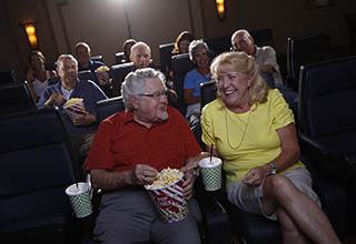 Seniors in the movie theater at Discovery Commons At College Park in Indianapolis, Indiana
