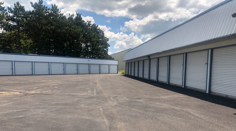 Exterior view of storage units with white doors at KO Storage of Becker in Becker, Minnesota