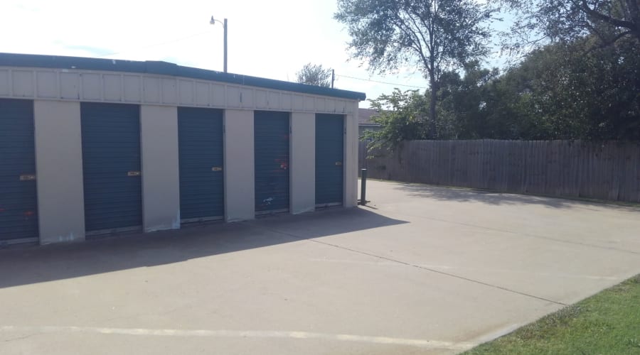 Storage units with blue doors at KO Storage of Salina - Beverly in Salina, Kansas