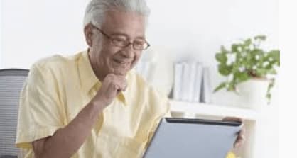 Man doing research of senior living communities