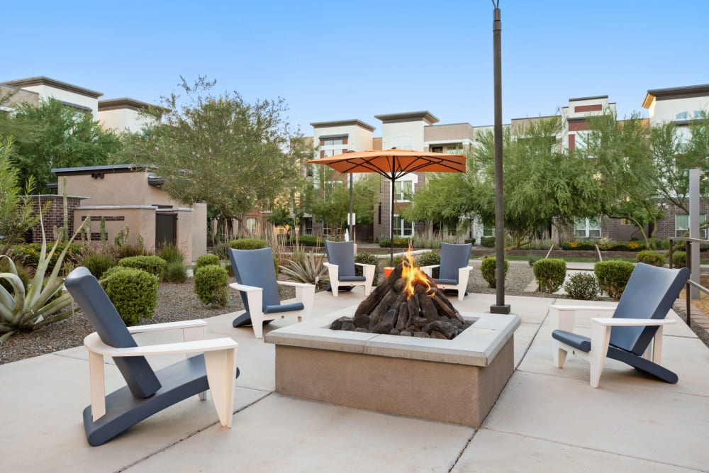 Outdoor lounge space with bonfire pits at Town Commons in Gilbert, Arizona