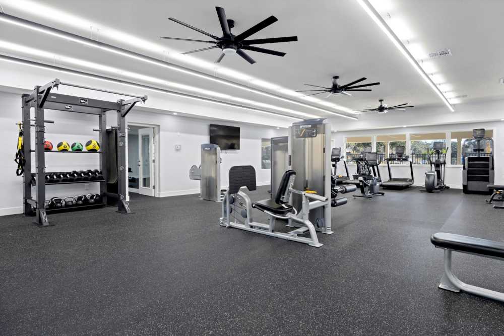 Fully-equipped fitness center at Carlton Arms Of South Lakeland in Lakeland, Florida