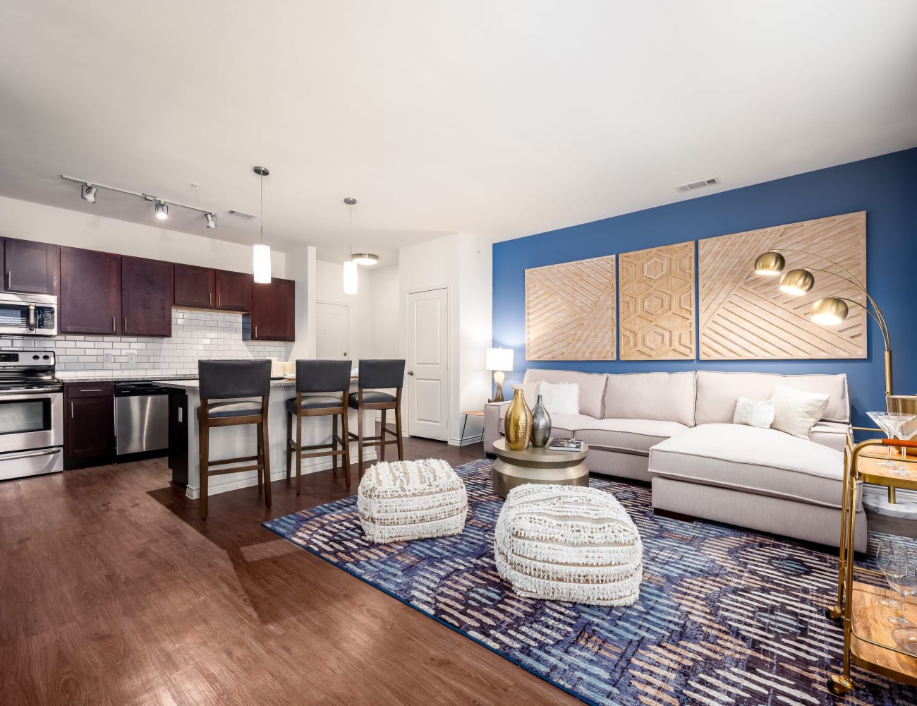 Open-concept layout with hardwood floors at 4 Corners Apartments in Frisco, Texas