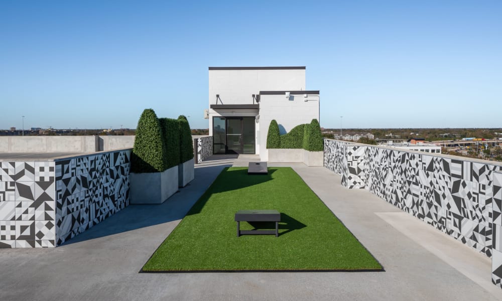 Rooftop cornhole at Bellrock Summer Street in Houston, Texas