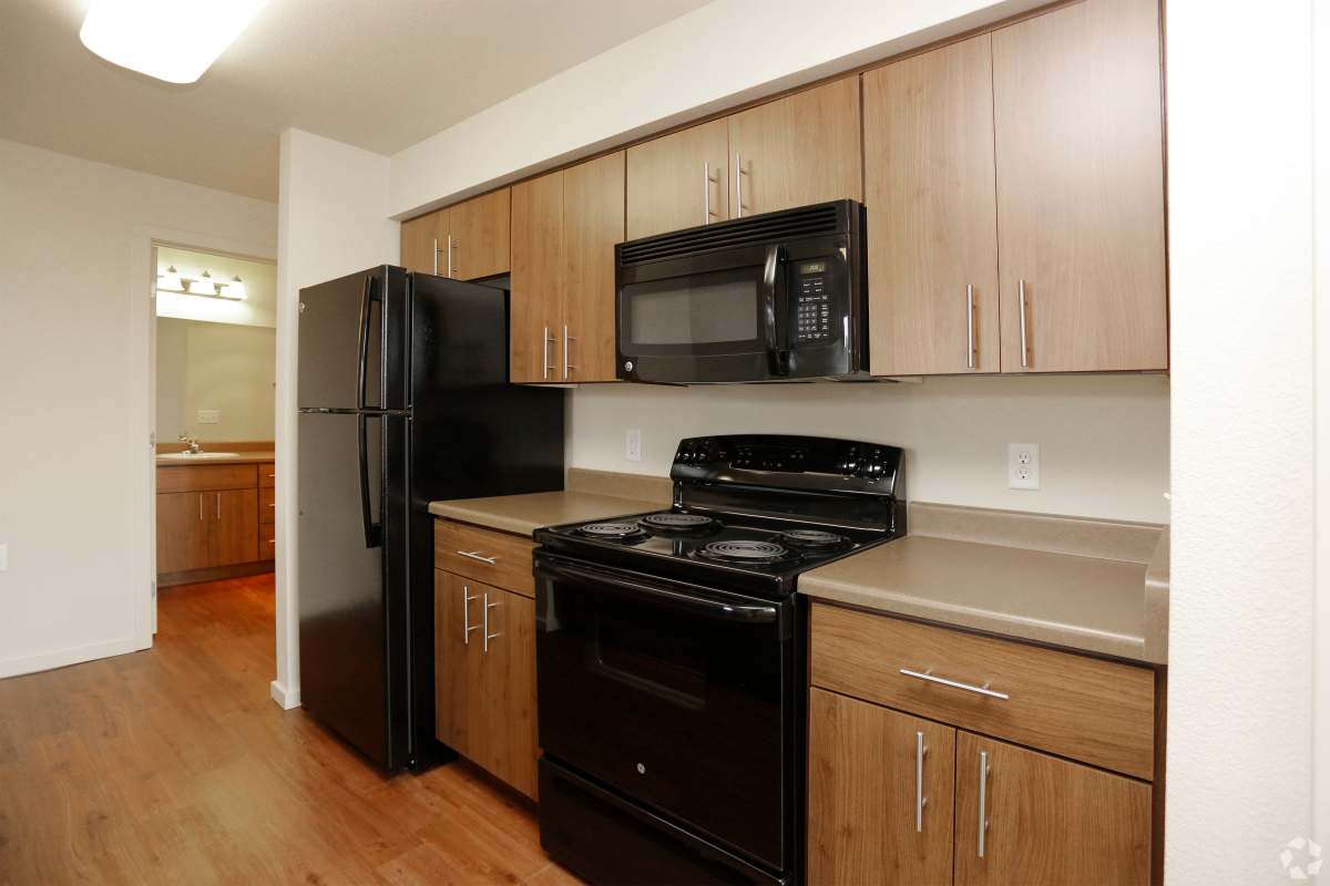 Well-equipped kitchen with stainless steel appliances at Copper Creek in Colorado Springs, Colorado