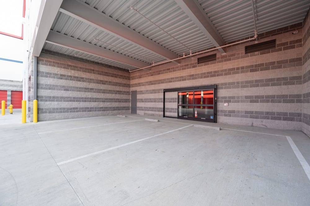 Covered parking area outside entrance to Trojan Storage of Commerce in Commerce, California