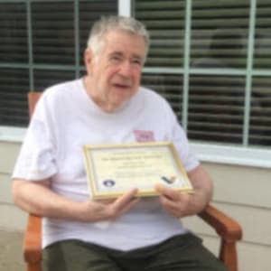 Resident Jim recognized for his service at Courtyard Estates at Cedar Pointe in Pleasant Hill, Iowa.