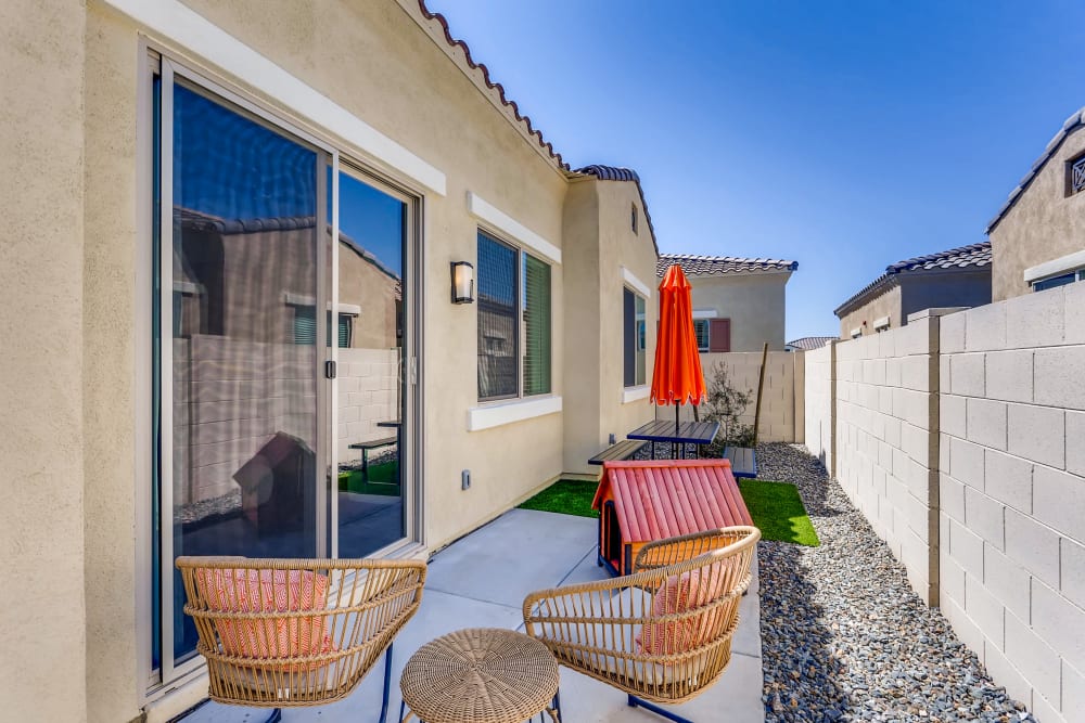 Avilla Camelback Ranch apartment featuring a backyard patio.