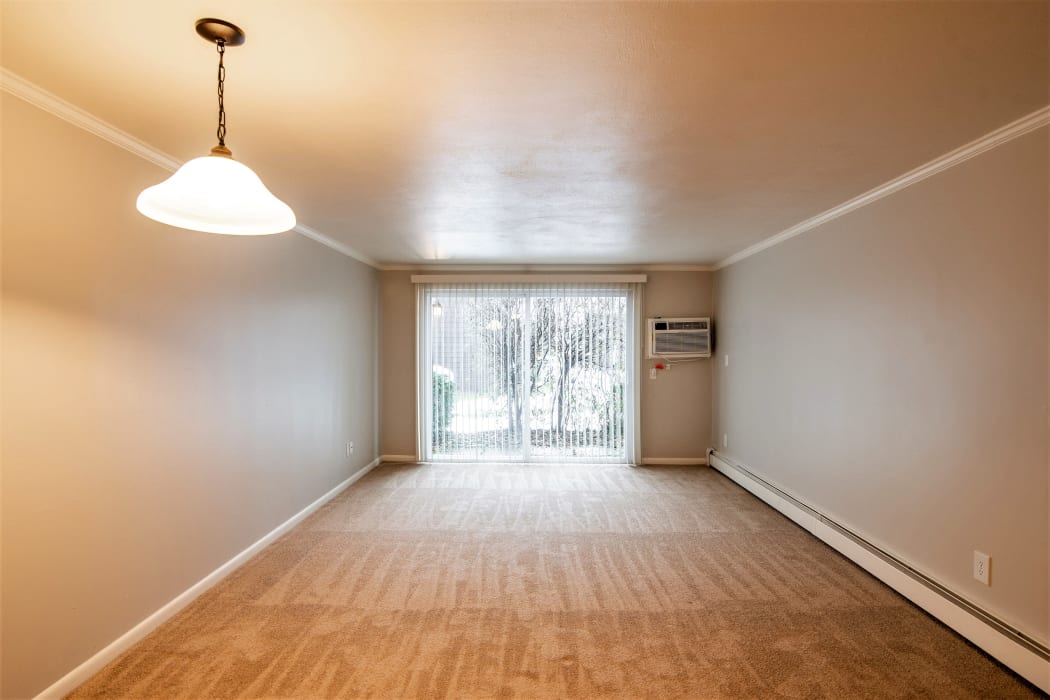 Village Green Apartments offers a cozy bedroom in Baldwinsville, NY
