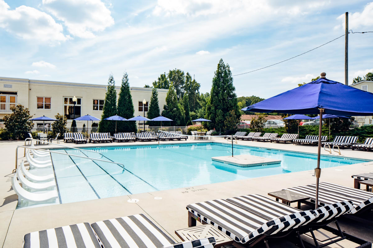 Resort-style swimming pool with a sundeck at The Vic in Greensboro, North Carolina