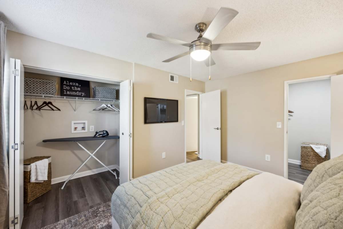 Model bedroom with closet space at Aspen Lodge in Overland Park, Kansas