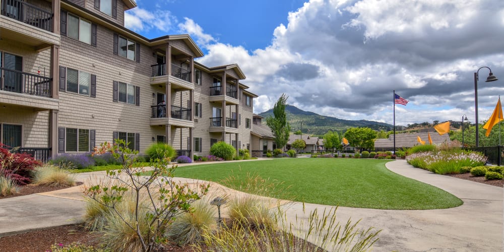 Large grassy area with walking paths at The Springs at Veranda Parkin Medford, Oregon