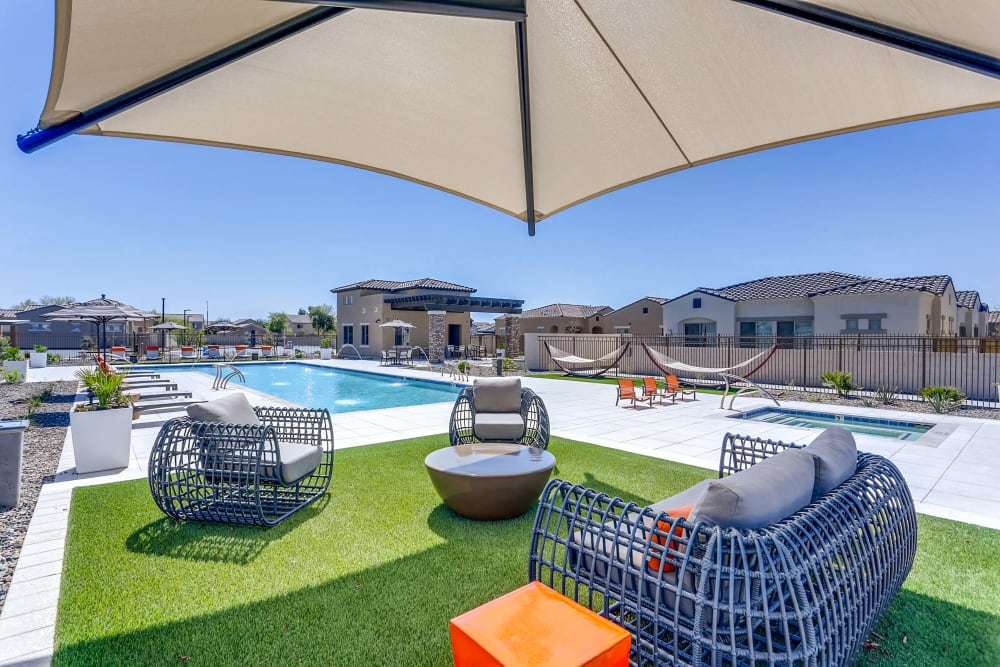 Pool and common area with shade at Avilla Camelback Ranch in Phoenix AZ