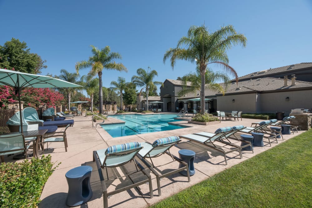Swimming with an expensive sundeck at River Oaks Apartment Homes in Vacaville, California
