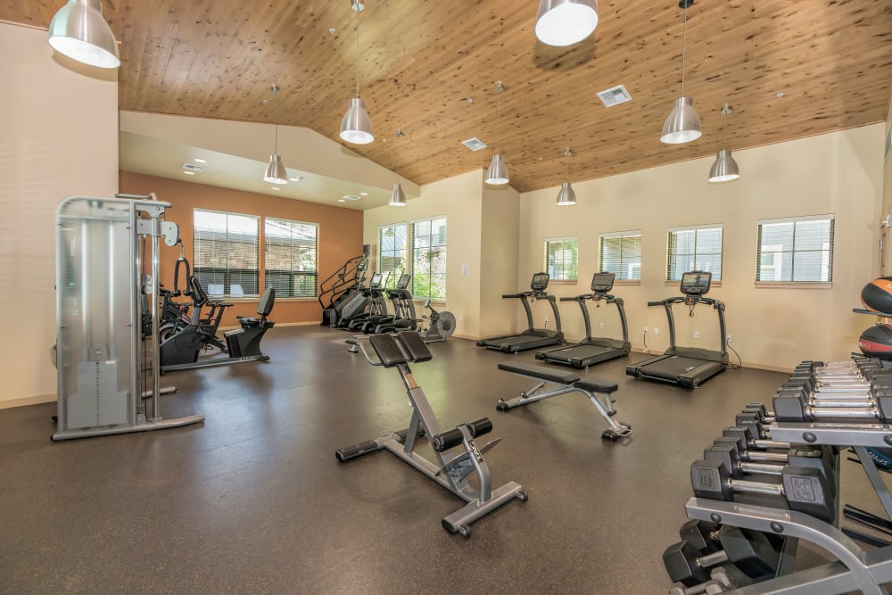 Spacious fitness center with individual workout stations at Eddyline at Bridgeport in Portland, Oregon