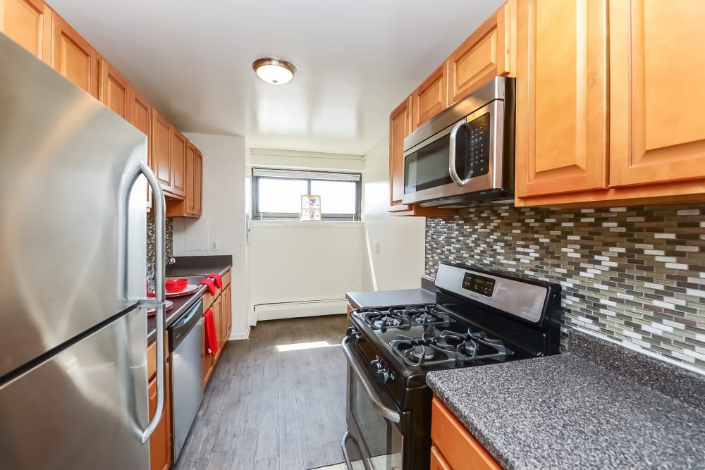 Kitchen at Riverside Towers Apartment Homes in New Brunswick, NJ