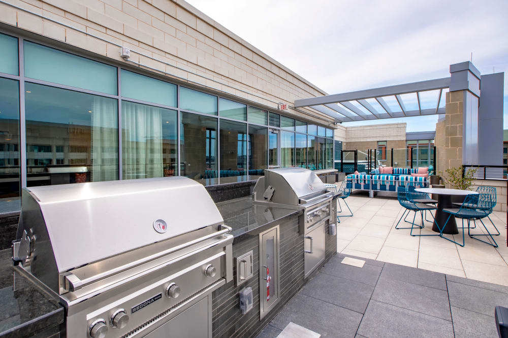 Roof-top barbecues with tables and chairs at Harlow in Washington, District of Columbia