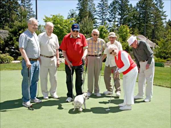 Residents golfing at Patriots Landing in DuPont, Washington. 