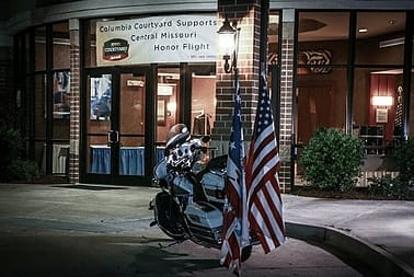 Motorcycle with American flag on the back