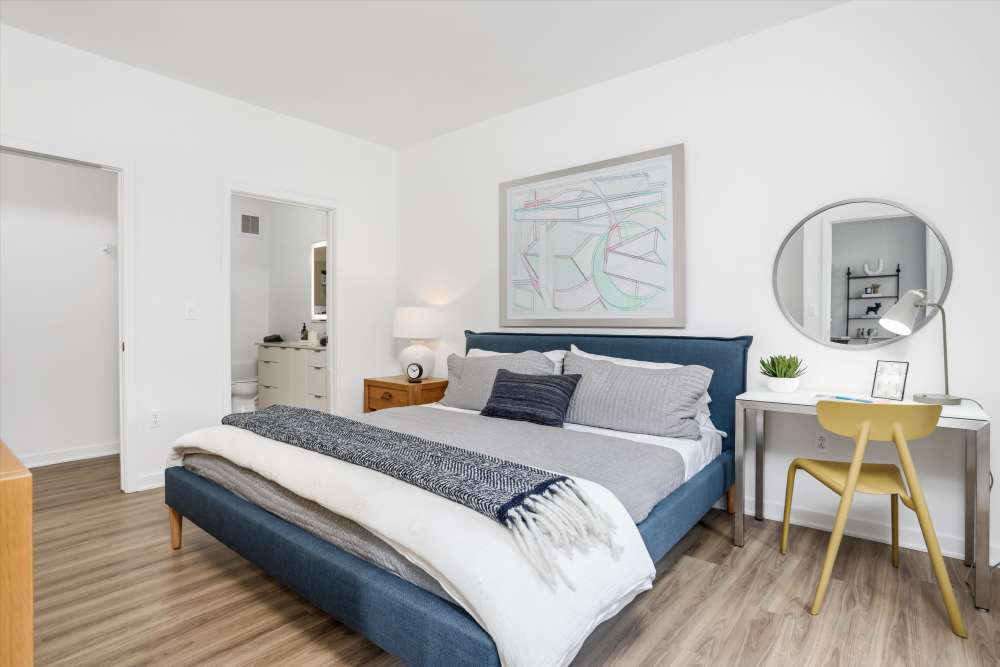 Bedroom with hardwood flooring at Innova in Novi, Michigan