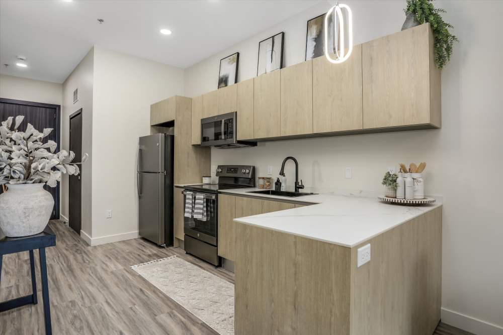 Kitchen with Countertops at Trio in Rochester Hills, Michigan