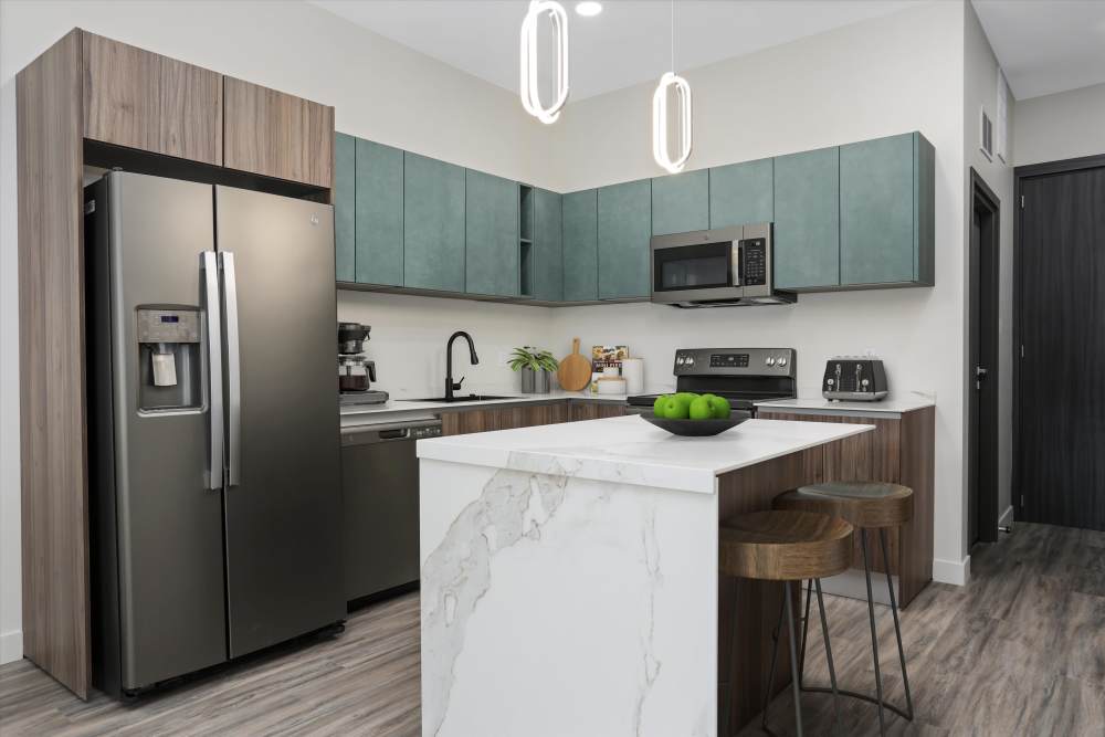 Kitchen with Dining Area at Trio in Rochester Hills, Michigan