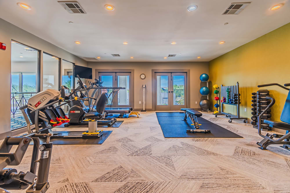 Well-equipped fitness center at The Spring at Silverton in Fort Worth, Texas.